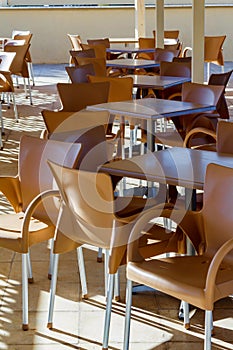 Restaurant tables and chairs in Corfu island photo