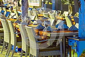 Restaurant tables and chairs on street