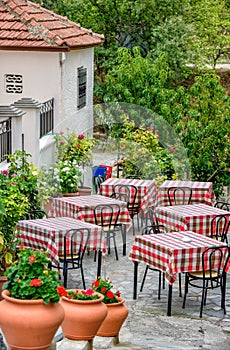 Restaurant tables on street terrace