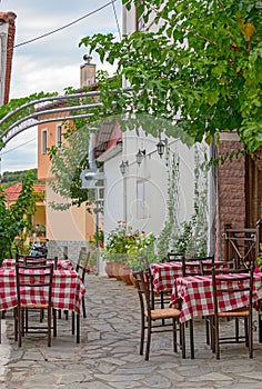 Restaurant tables on street terrace