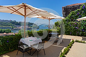 restaurant with tables to enjoying the view over Porto Portugal from the Jardins do Palacio de Cristal Crystal Palace