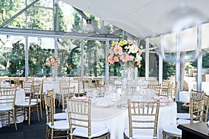 Restaurant wedding setup with flowers photo