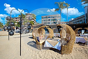 Restaurants and cafes with ocean views on Playa De Los Muertos beach on Puerto Vallarta Malecon