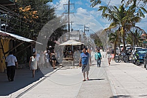 Restaurants and tourists on avenida tulum, tulum, quintana roo, mexico