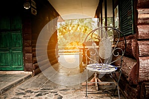 Resting corner with wooden chair and sunlight