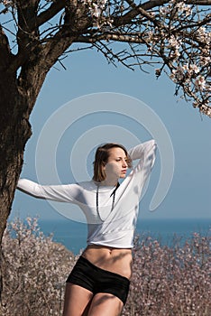 Resting under a blossoming almond tree