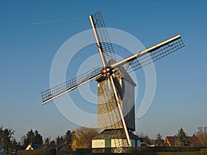 Restorated old windmill photo