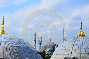 Restoration of the Blue Mosque in Istanbul. View between the domes of Hagia Sophia