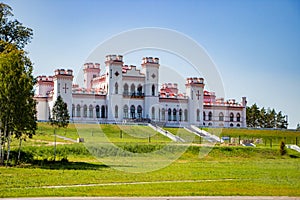 Restoration of an old medieval castle. Beautiful facade of the palace in Kossovo, Brest region, Belarus. Summer landscape