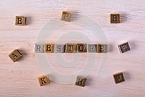 Restore word metal block photo