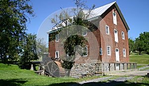 Old Restored brick Gristmill and Driveway photo