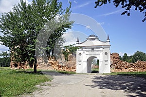 Restored entrance gate and remains of the walls of the Carthusian monastery of 1648-1666 in the town of Bereza, Belarus
