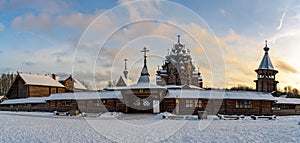 Restored orthodox wooden Twenty-five-headed Church of the Intercession of the Blessed Virgin Pokrovskaya at sunny winter day. St.