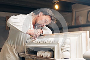 Restorer making his work