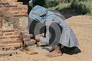 Restorative woman working, Bagan photo
