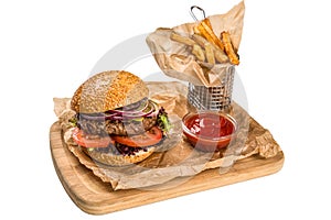 Restourant serving dish - burger with meat, frying potato on woo