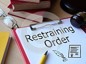 Restraining Order is shown on the photo using the text