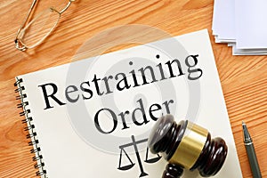 Restraining Order is shown on the photo using the text