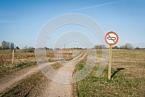 Restricted area sign with a tank