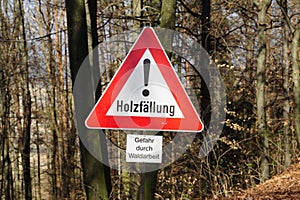 Restricted area sign during woodcutting and logging