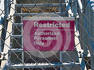 Restricted Authorized personnel sign