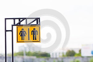 Restroom sign Hanging on the ceiling in the department store. image for sign and symbol object.