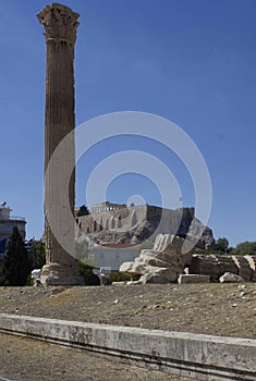 Rests of Olympian Zeus temple, with the Athens Acropolis in the background