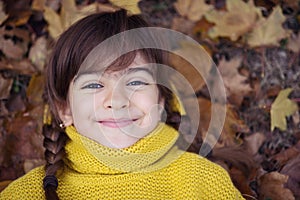 Resubmit Smiling girl with braids in autumn