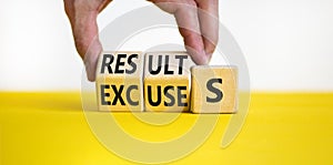 Result or excuse symbol. Concept words Results or excuses on wooden blocks. Businessman hand change words Excuses on Results.