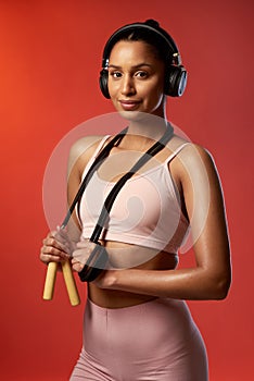 Results are achieved with consistency. Studio portrait of a sporty young woman posing with a skipping rope around her