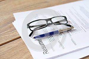 Resume application on desk ready to be reviewed