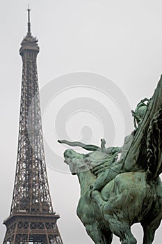 Resurgent France pointing towards the Eiffel Tower in Paris