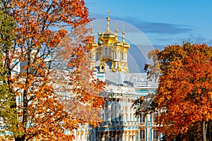 Resurrection church dome of Catherine palce in autumn foliage, Tsarskoe Selo Pushkin, Saint Petersburg, Russia photo