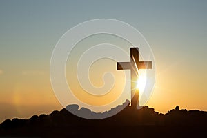 Resurrection concept:Crucifixion Of Jesus Christ Cross At Sunset