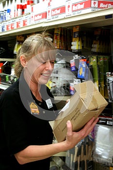 Retail Associate Putting out Stock photo