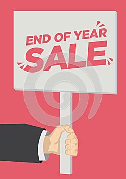 Retail End of year Sale promotion shoutout with a placard banner against a red background photo