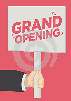 Retail Grand Opening promotion shoutout with a placard banner against a red background photo