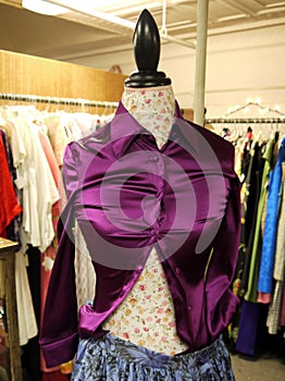 Retail: second hand clothes purple shirt