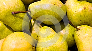 Retail store produce Bartlett pears in a pile