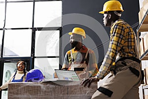 Retail storehouse order pickers checking purchased items listing