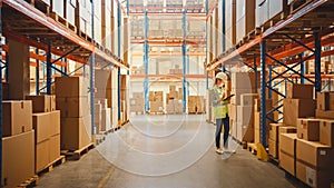 Retail Warehouse full of Shelves with Goods in Cardboard Boxes, Female Worker Checks and Sorts Pac