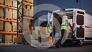 Retailer Warehouse Two Happy Workers Talk, Joke use Hand Pallet Truck Start Loading Delivery Truck