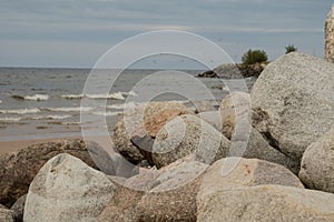 Retaining wall made of stones, boulders.