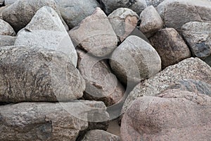 Retaining wall made of stones, boulders.