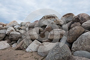 Retaining wall made of stones, boulders.