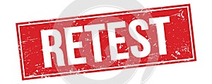 RETEST text on red grungy rectangle stamp