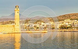 Rethymno, Greece island Crete, Peaceful landscape on the bay before sunset view of the lighthouse and the waterfront