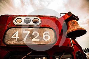 Retired Canadian Pacific train engine with overcast sky