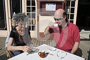 Retired couple enjoying coffee