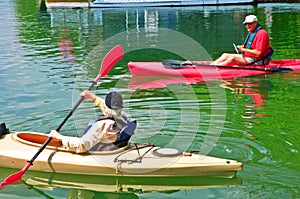 Retired Couple on Kayaks photo